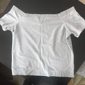 Off the shoulder sweatshirt.